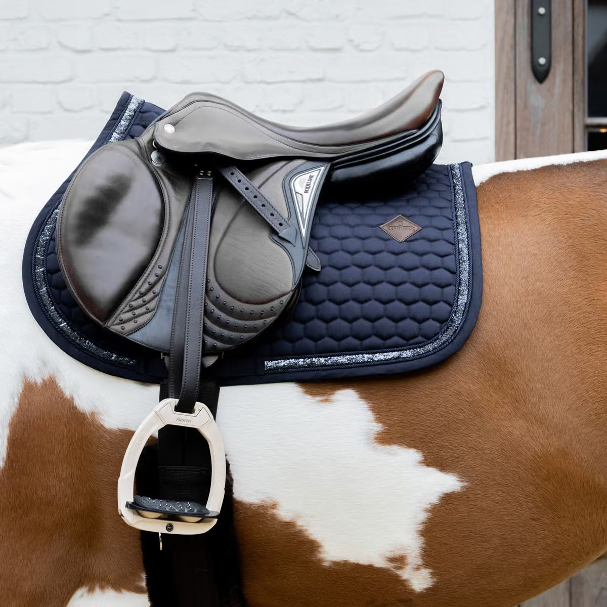 Kentucky Horsewear Glitter Band jumping saddle pad with glitter border